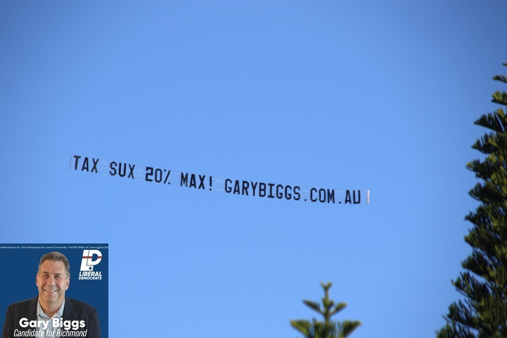 Sky banner reads "Tax Sux 20% Max!"