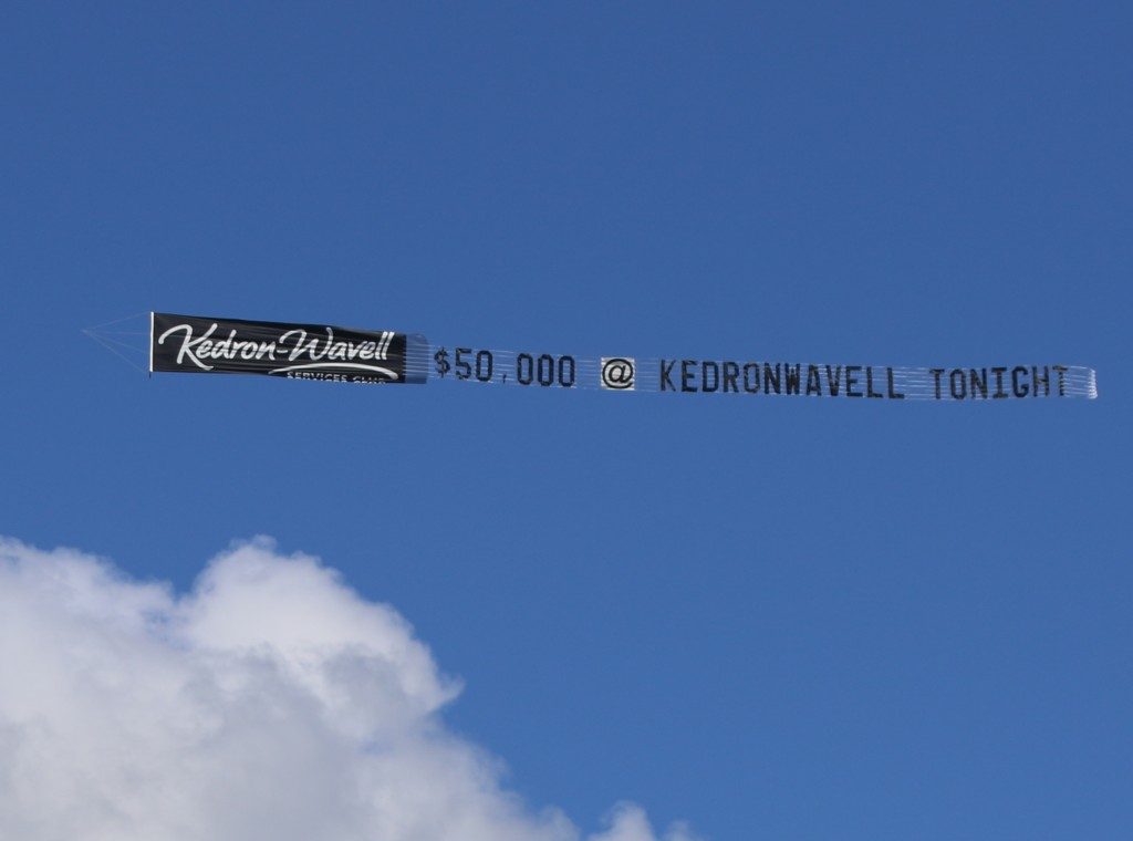 Ketronwavell services club sky advertising reads $50,000 @kedronwavel tonight
