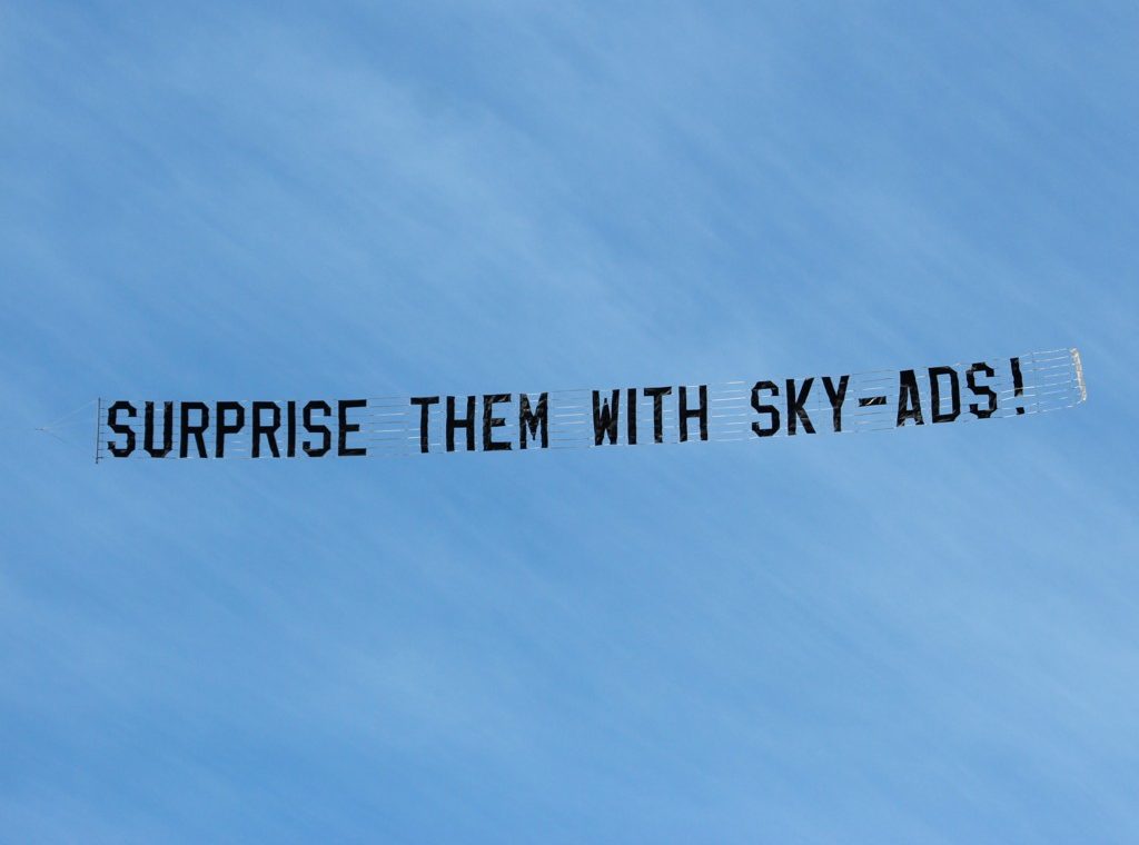 Banner reads "Surprise them with SKY-ADS"